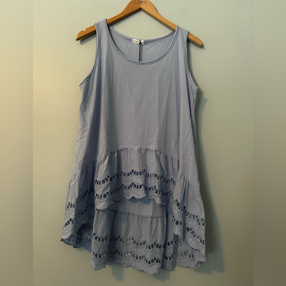 Made in Italy hi/lo top in light blue.  Never worn. One size top.